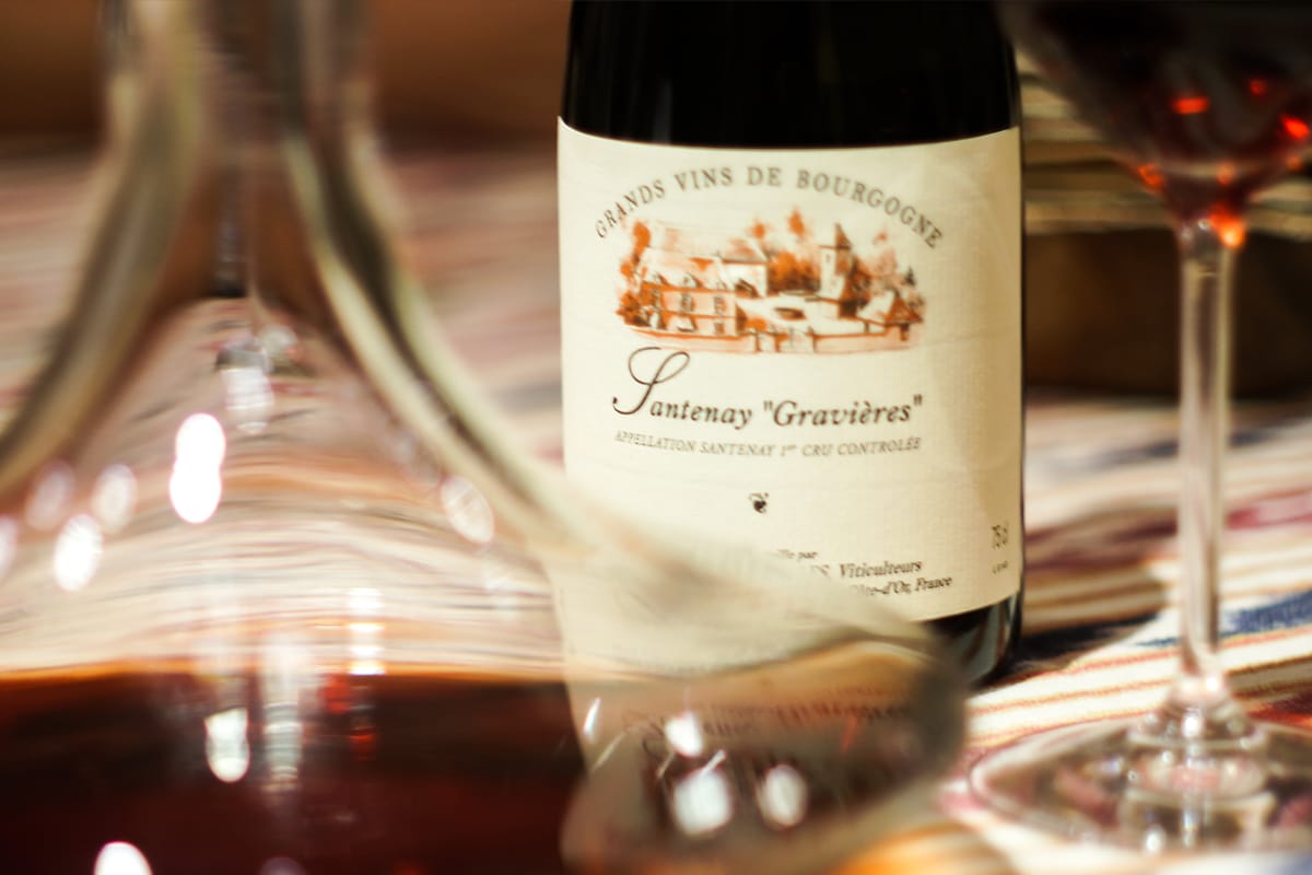 Decanter, a bottle of Santenay “Gravières,” and a glass of red wine