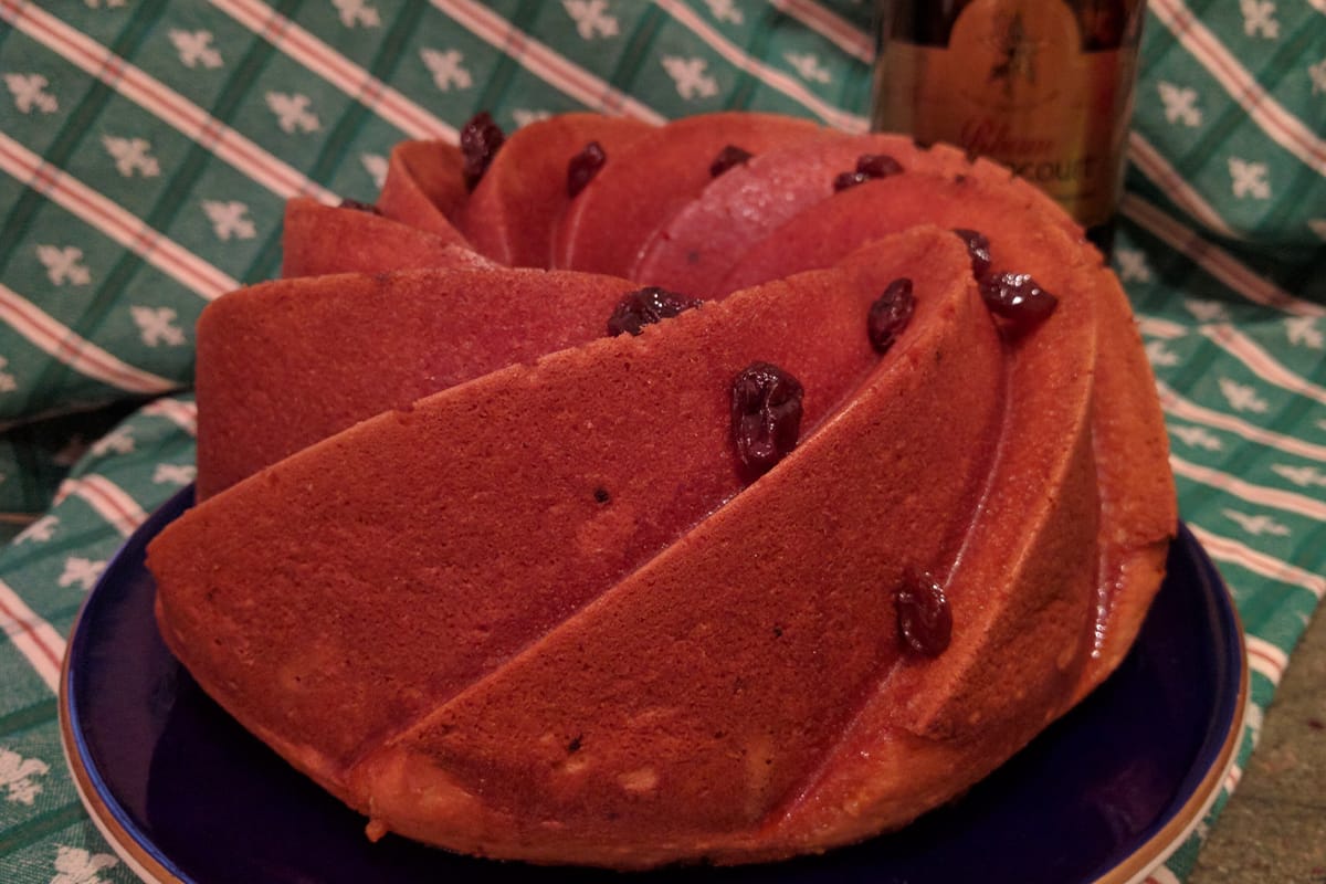 Bundt cake beside a bottle of Rhum Barbancourt